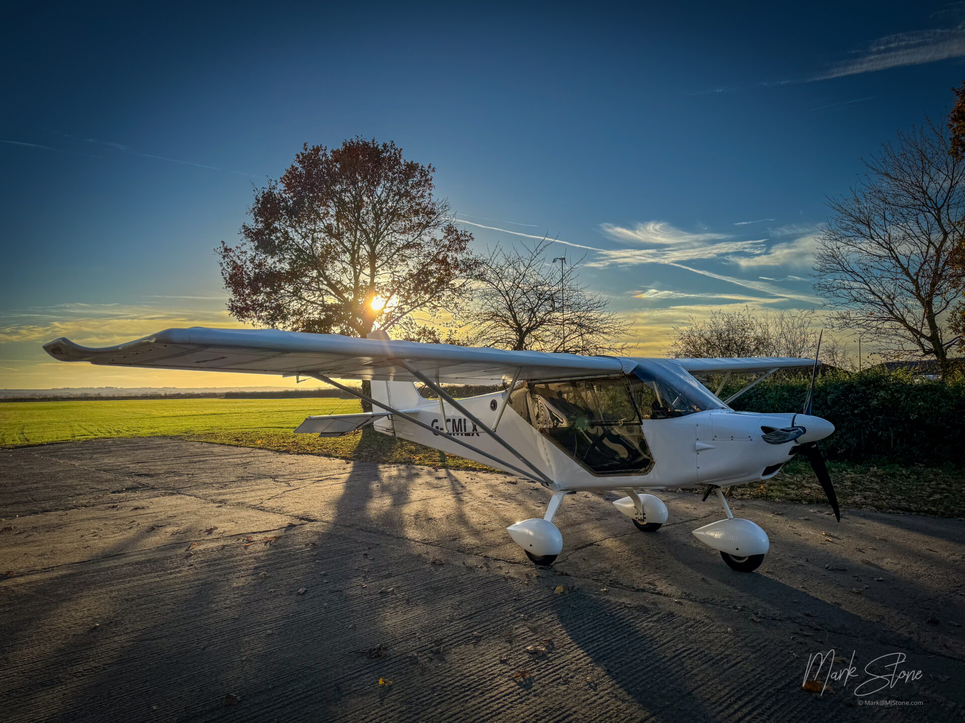 Syndicate microlight at sunset